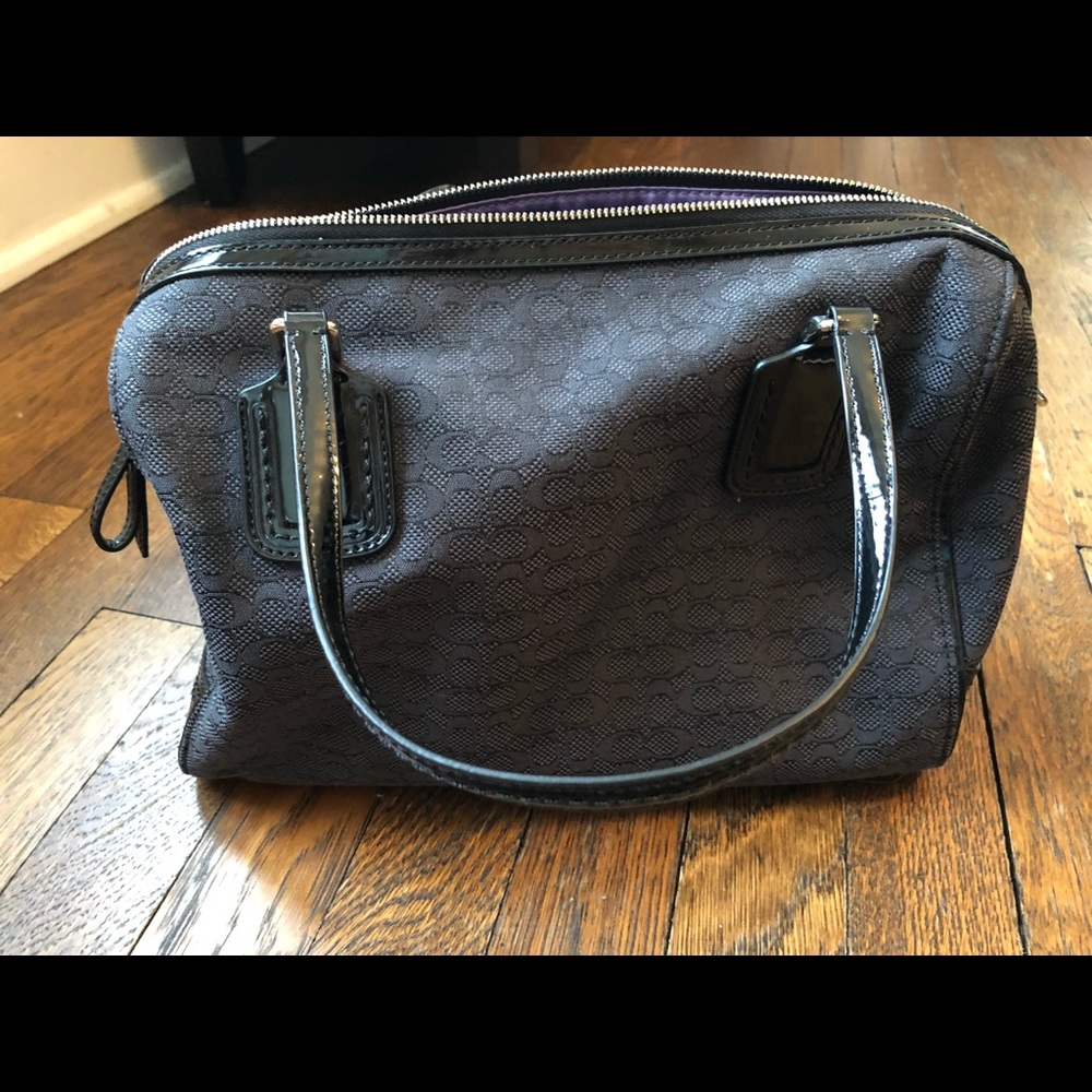 Med sized black coach satchel w/ small “c” pattern